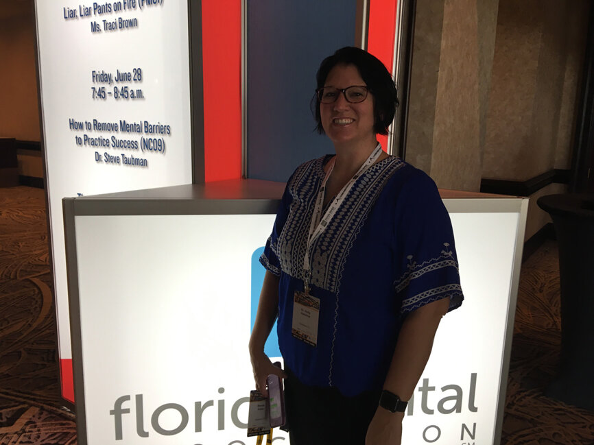 Dr. Holly Hamilton of Sebastian, Fla., outside the opening session Thursday morning during the FDC.