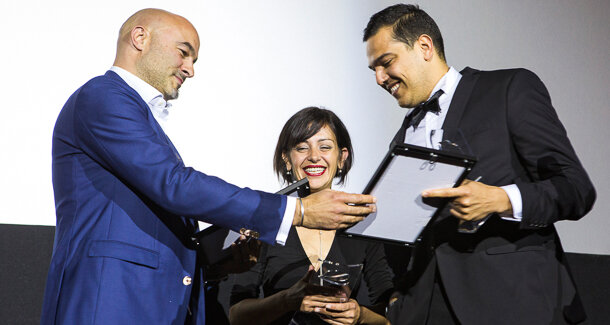From left: Torsten Oemus presenting the award for composite restoration to Dr Lora Georgieva and Dr Sofien Riahi.