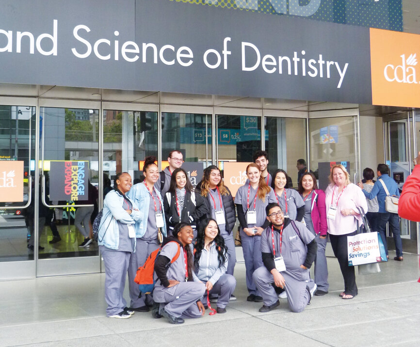ADHP dental students pause for a commemorative group photo before heading into CDA Presents at Moscone South in San Francisco. (Photo: Sierra Rendon, DTA) 