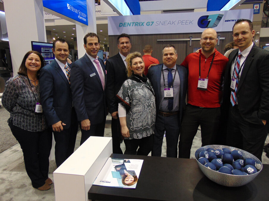 The folks from Henry Schein eServices are eager to tell you about Dentrix G7. (Photo: Fred Michmershuizen/Dental Tribune America)