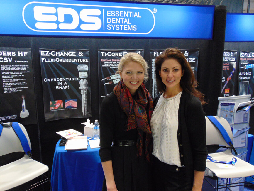 Elizabeth Malcolm, left, and Gina Susino of EDS/Essential Dental Systems. SafeSiders HF helical flat rotary instruments and the Endo-CSV cordless endo motor are among the new products at EDS this year.