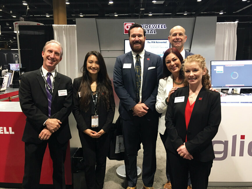 From left: Andy Klein, Annie Lee, Richard Shaw, Rob Brenneise, Monica Silva and Jenny Gardner are all smiles at the Glidewell booth.