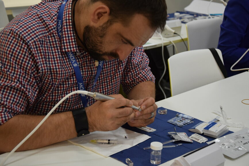 A ROOTS SUMMIT attendee enjoying the hands-on learning.