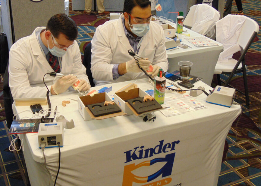 Meeting attendees engage in hands-on learning at Kinder Krowns. (Photo by Fred Michmershuizen/Dental Tribune America)