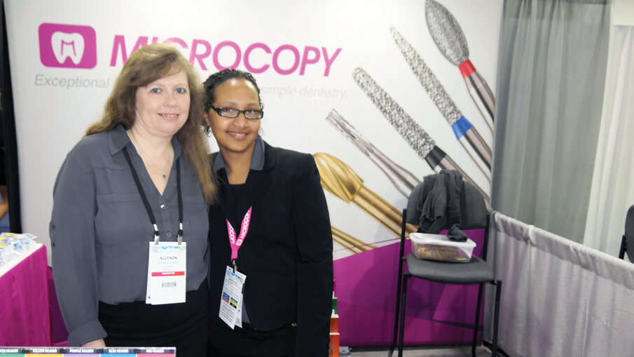 Allison Stancil, left, and Simmone Ellis at the Microcopy booth.
