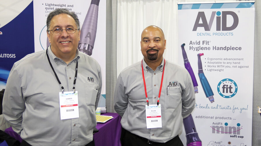 At the Avid booth, President and CEO Chris Carron, left, and Ellis Bentley Jr. are happy to tell you all about the new Avid Premiere Hygiene Handpiece.