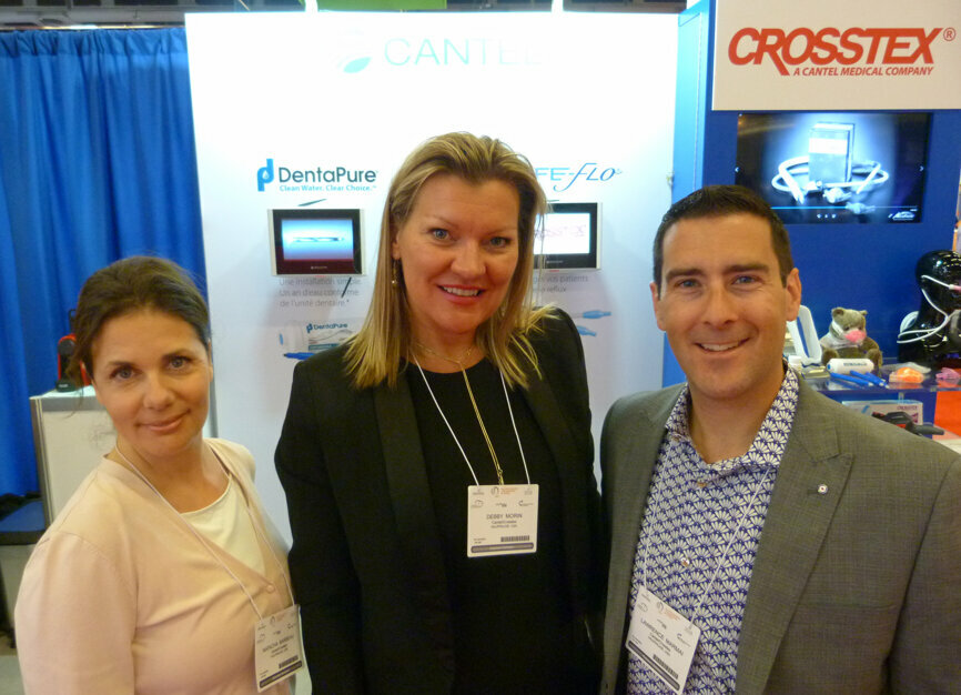 From left: Natacha Barbeau, Debby Morin and Lawrence Marmai in the Cantel/Crosstex booth.