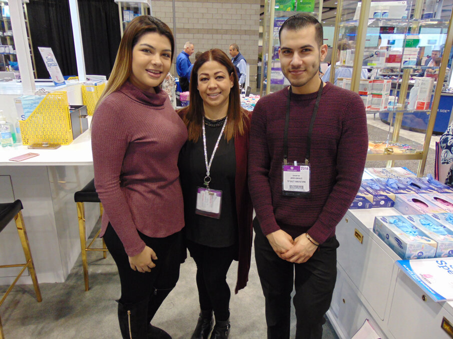 From left: Alejandra Renteria, Mary Franco and Javier Gonzalez of Top Quality Mfg. (Photo: Fred Michmershuizen/Dental Tribune America)