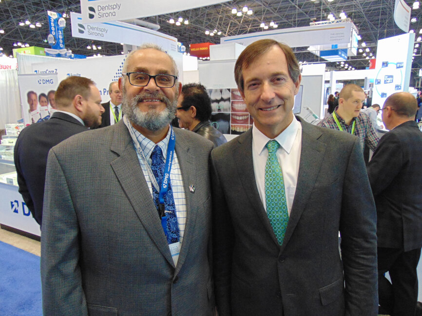 Mark Eisen, left, and Dr. Wolfgang Mühlbauer of DMG. (Photo: Fred Michmershuizen/Dental Tribune America)