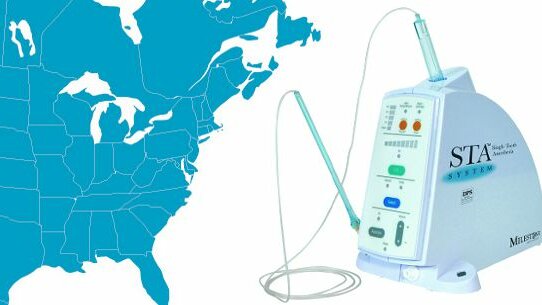 Milestone hands distribution of dental anesthesia system to Aseptico