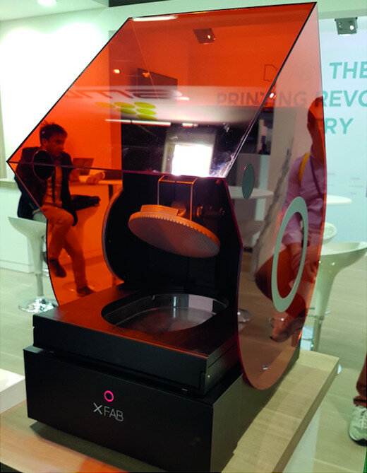 Fig. 20a: SLA 3D printers presented at the 2017 IDS: XFAB printer (a) and Formlabs’ Form 2 printer (b).