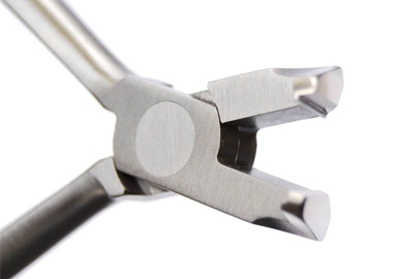 DISTAL END CUTTER WITH SAFETY HOLD