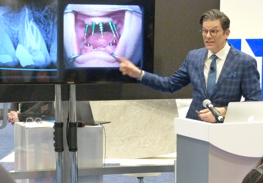 Dr. Stephane Reinhardt presents ‘Step by Step Practice Growth: Integrating Invisalign in Your Day to Day General Dental Practice’ in the Align Technology booth. (Photo: Robert Selleck/Dental Tribune)