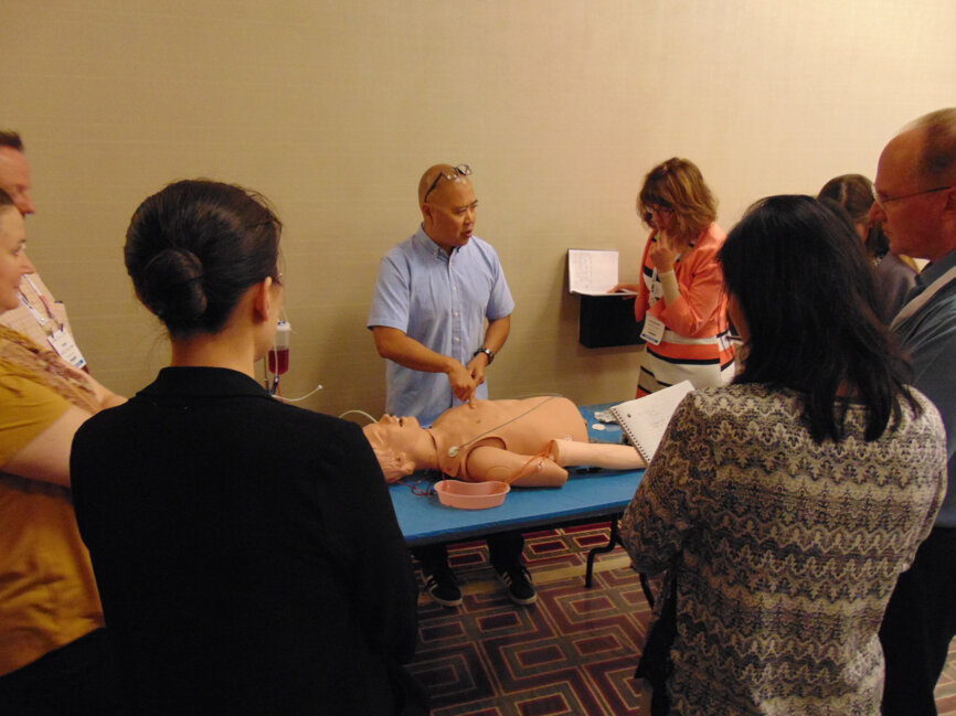 Meeting attendees get hands-on instruction during ‘Pain and anxiety: When traditional patient management fails’ Thursday morning.