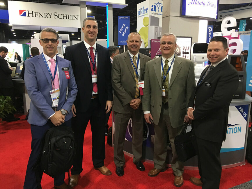 Enjoying a commanding presence in its own backyard, Atlanta Dental Supply enjoys a steady stream of visitors. On hand to guide visitors through the vast selection of Atlanta Dental Supply’s offerings are, from left, Charles Harrell, Jim Maxwell, Bob Brown, Daryl Bernard and Jim Gentile.