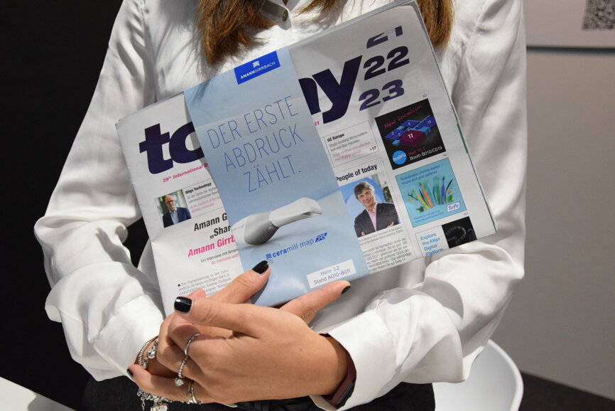 Fresh off the printer: The current issue of the daily today at IDS newspaper. (Image: Dental Tribune International) 