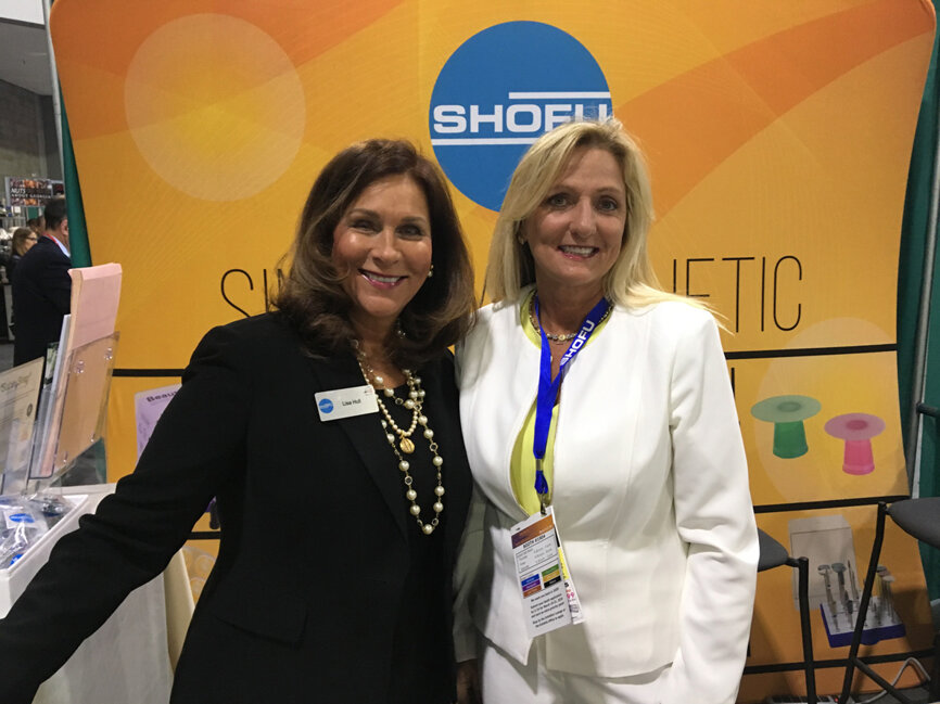 From left, Lisa Hull and Leann MacDonald in the Shofu Dental Corp. booth.