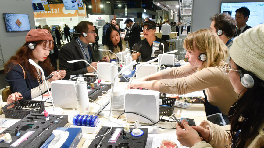 Internationally renowned dentists and dental technicians provided hands-on courses and laboratory demonstrations at GC’s booth at IDS. (Image: Koelnmesse /IDS)