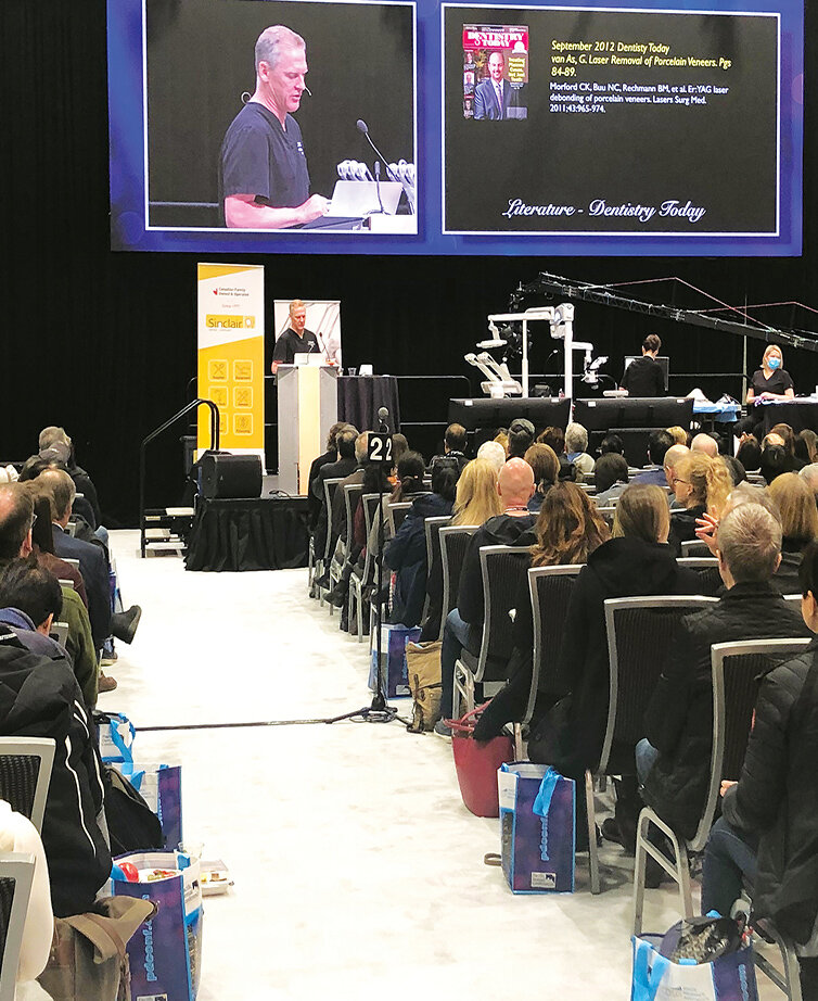 Glen van As, DMD, of British Columbia, on the Live Dentistry Stage, explains his case of laser removal of porcelain veneers. ‘It’s always an honor to lecture in your own home city,’ he said.