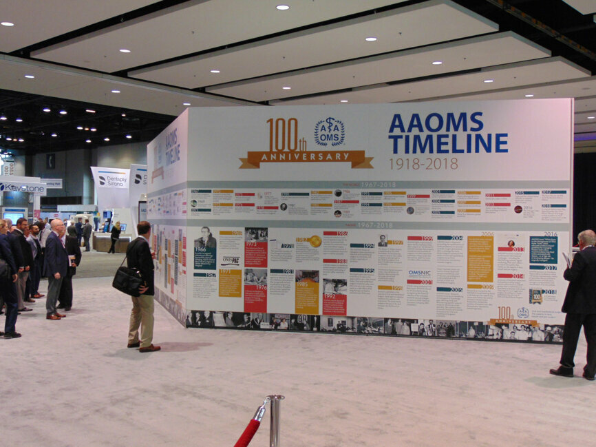 The AAOMS timeline is one of many displays on the exhibit hall floor to help commemorate the association’s 100-year milestone.