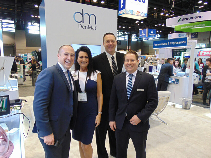 The reps from DenMat have plenty to smile about. From left: Ryan Weppler, Doreen Schillinger, Mack Bradley and Jason Dempsey. (Photo: Fred Michmershuizen/Dental Tribune America)