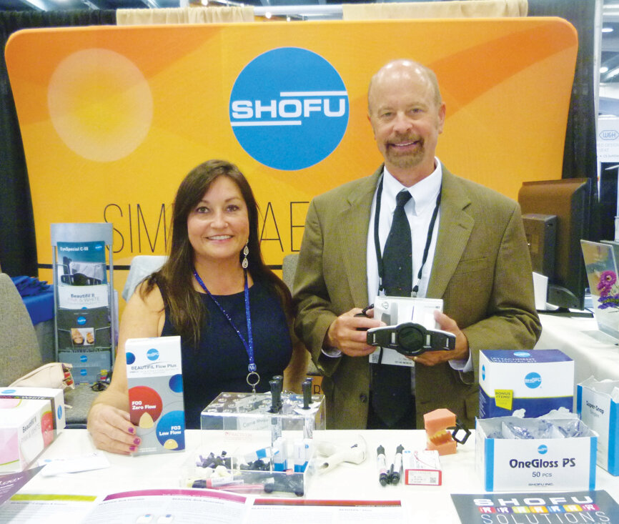 Don Christensen and Carrie Maggard at the Shofu booth. (Photo: Sierra Rendon, DTA)