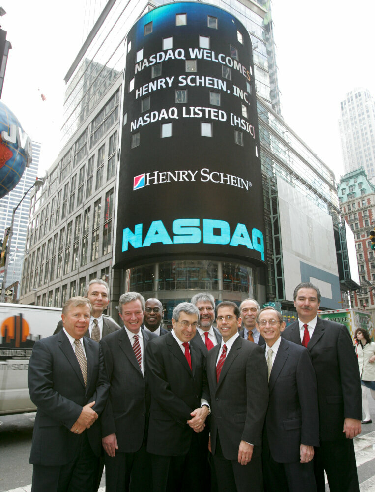 Henry Schein Inc has been publicly listed on the Nasdaq since 1995—here, executive officers celebrate the company’s success in 2005. (Image: Henry Schein)
