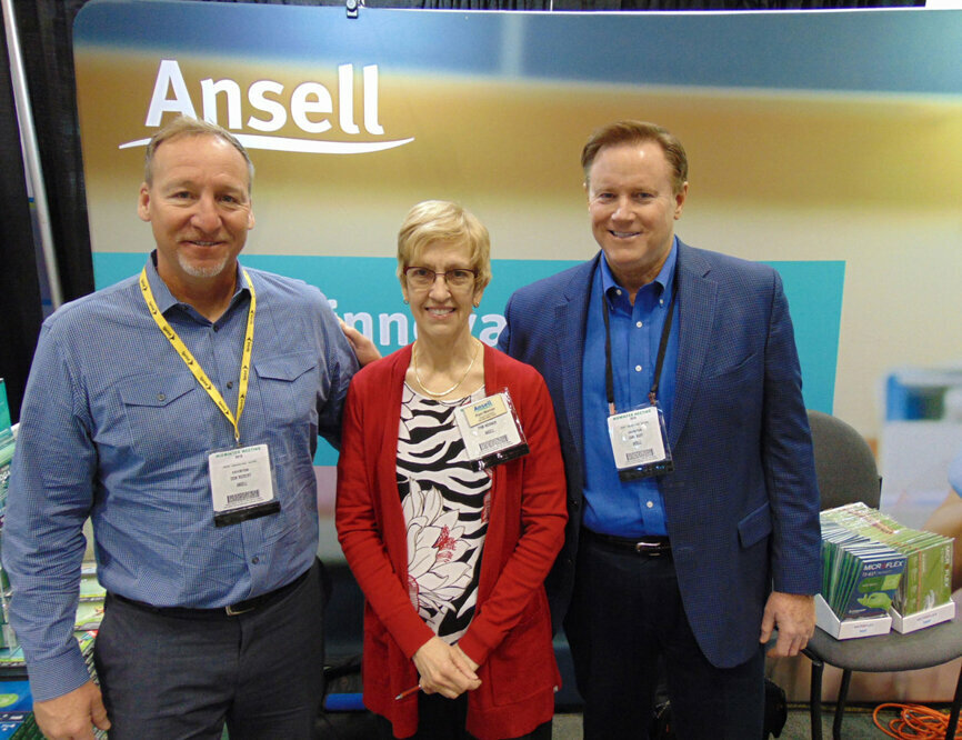 From left: Don Rickert, Pam Werner and Carl Huff of Ansell. (Photo: Fred Michmershuizen/Dental Tribune America) 
