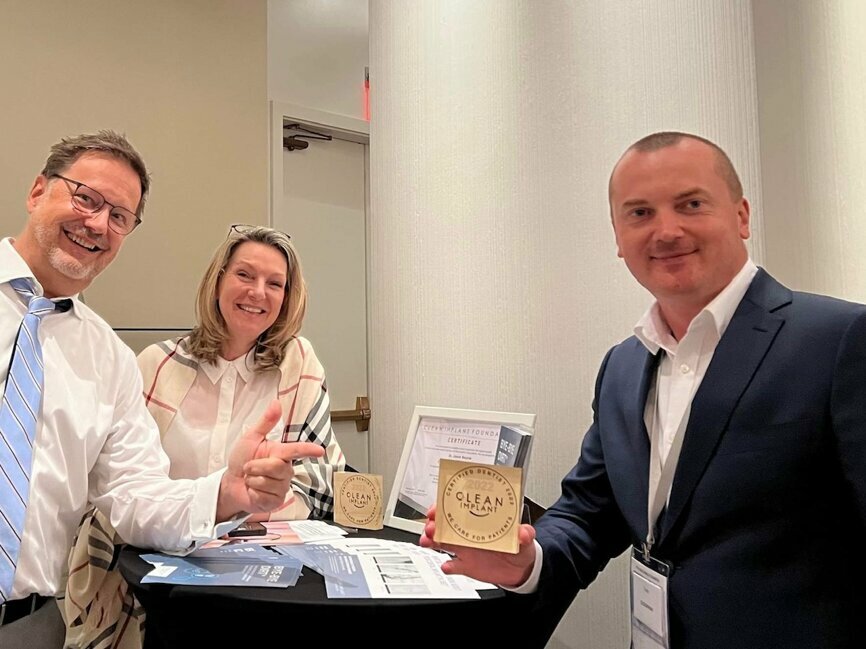 From left: Dr Dirk Duddeck and Barbara Sonntag of the CleanImplant Foundation introducing the organisation’s certification and benefits of membership for dentists to Dr Tudor Cocerhan from Romania.