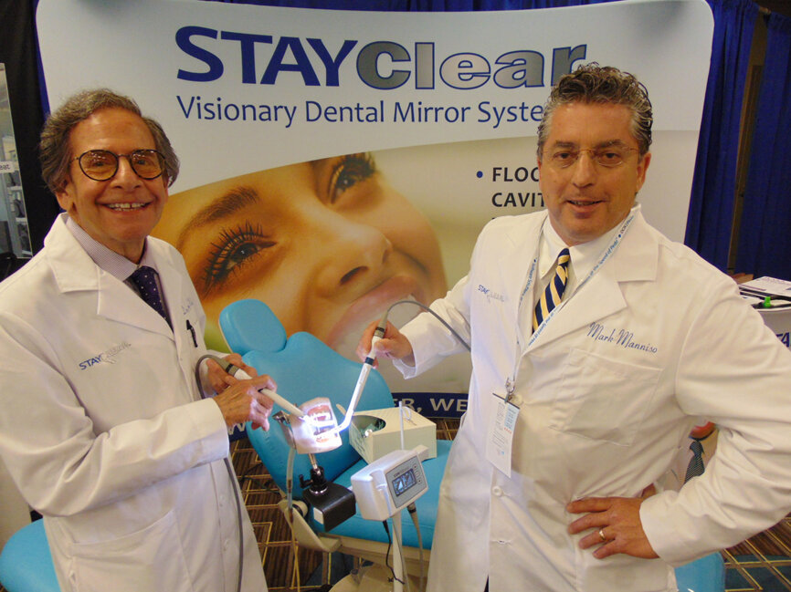 Dr. Jeffrey Watson, left, and Mark Manniso of StayClear Dental Mirror Systems. (Photo by Fred Michmershuizen/Dental Tribune America)