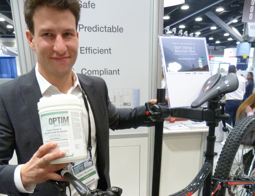 If you buy 10 containers of the OPTIM disinfectant wipes (and get two free) you also get entered into a drawing for a Giant Stance 2 mountain bike in the SciCan booth. Julien can tell about all SciCan products, including the latest autoclave chambers, which are getting lots of attention in the Exhibit Hall. (Photo: Robert Selleck/Dental Tribune)