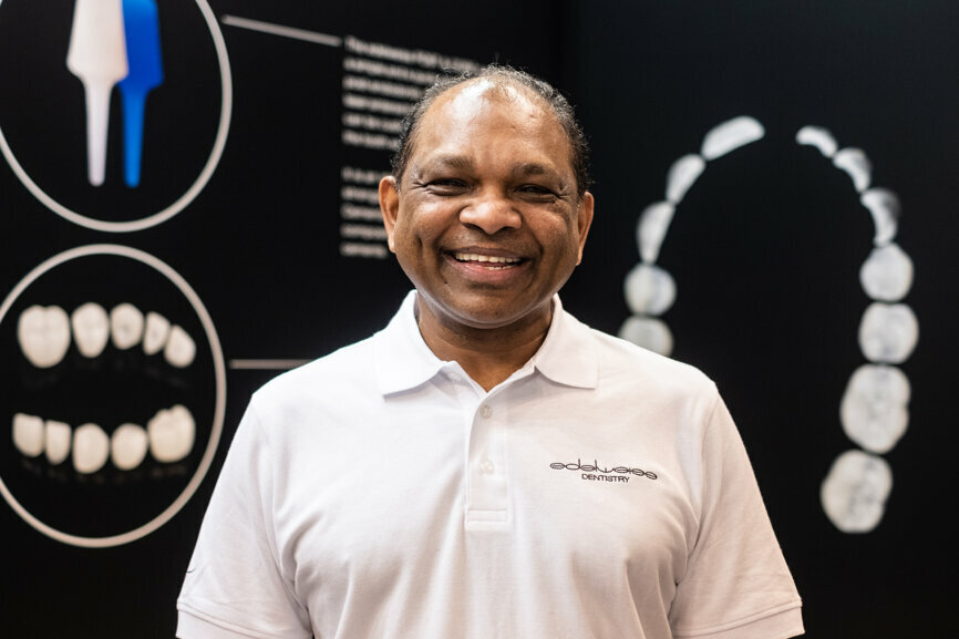 Dr Desigar Moodley from the research department at composite veneers company edelweiss at the company’s booth. (Photograph: Robert Strehler, DTI)