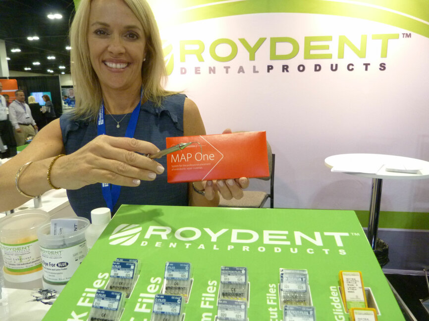 Tanya Beck in the Roydant Dental Products booth with the MAP One intro kit.