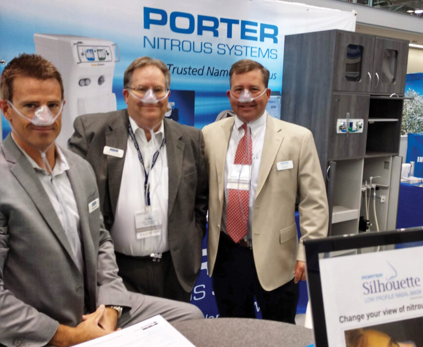Come try out the Silhouette at the Porter Instrument booth with the help of Matt Bowen, left, Tracy Thompson and Bo Sutch.
